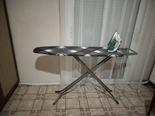 a chair with a laptop sitting on top of it at Σαν Στο Σπίτι Σας in Xanthi