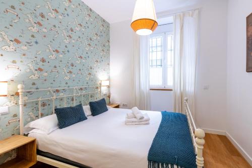 Posteľ alebo postele v izbe v ubytovaní Veoapartment Alhóndiga Bajo