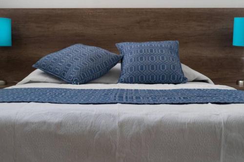 Giường trong phòng chung tại R4 Oaxaca Experience