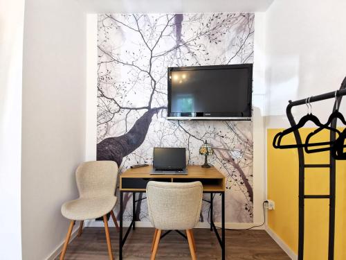 Μια τηλεόραση ή/και κέντρο ψυχαγωγίας στο BohnApartments Franzstraße - kostenlose Parkplätze - sehr ruhig - Neubau - Vollausstattung - WLAN