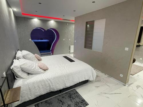 Giường trong phòng chung tại Lescapade