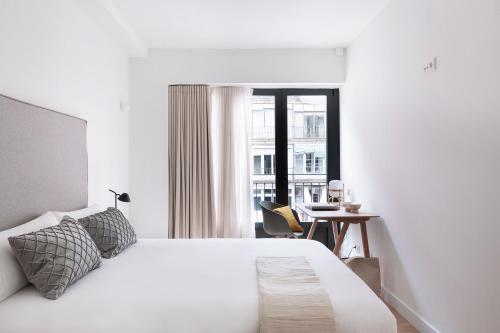 Una cama o camas en una habitación de Casa Mercader - Simaba Group