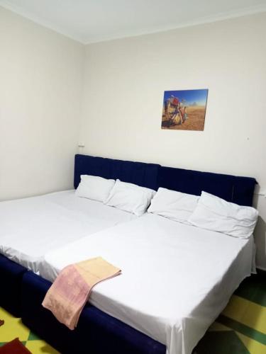 Postel nebo postele na pokoji v ubytování Eljoker pyramids hostel