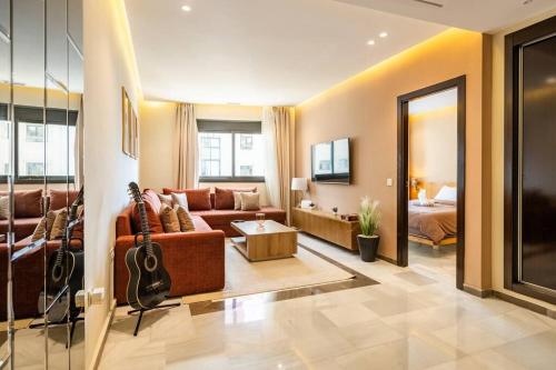 Et opholdsområde på Coral Coastal Suite - Beach & Pool