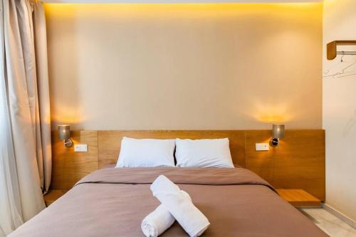 En eller flere senge i et værelse på Coral Coastal Suite - Beach & Pool