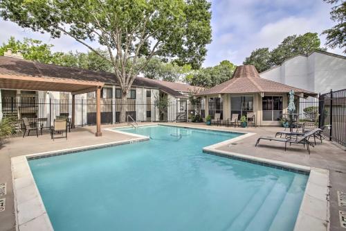 an image of a swimming pool at a house at Waterfront Condo on Lake Conroe with Boat Launch! in Montgomery