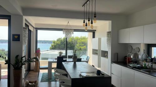 Η κουζίνα ή μικρή κουζίνα στο Luxury Apartment Eszter