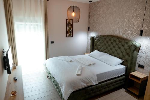 Top Zlatar Apartmaniにあるベッド