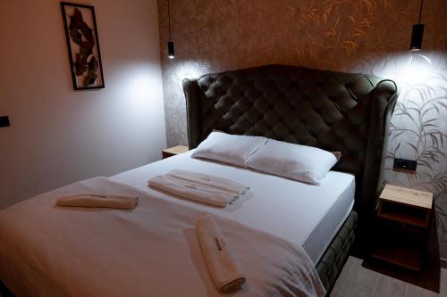 Top Zlatar Apartmaniにあるベッド