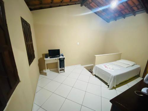 Postel nebo postele na pokoji v ubytování Pousada Da Lú