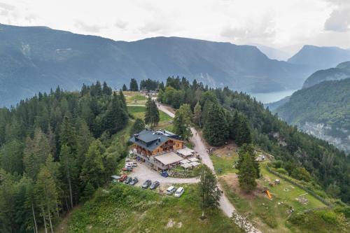 an aerial view of a house in the mountains at Rifugio La Montanara in Molveno