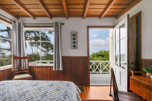 a bedroom with a bed and a large window at The Porter House - Sweeping Ocean Views - La Jolla in San Diego
