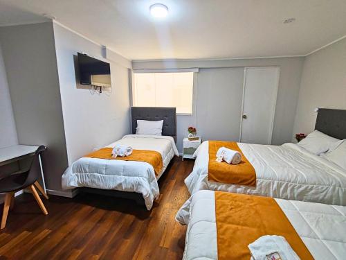 Katil atau katil-katil dalam bilik di Hotel Terrazas del sol