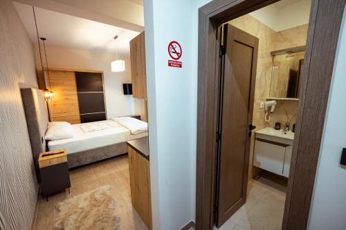 Top Zlatar Apartmaniにあるベッド