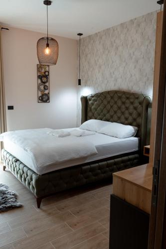 Top Zlatar Apartmaniにあるベッド