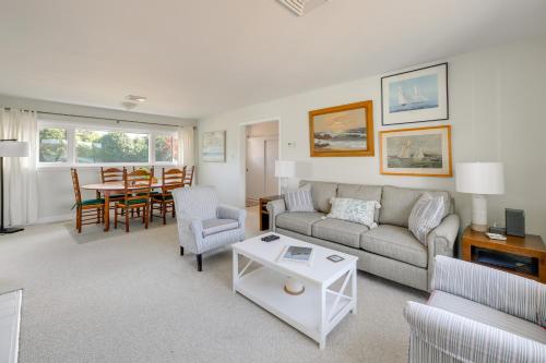 a living room with a couch and a table at Waterfront Home with Dock in Chesapeake Bay Area! in Lancaster