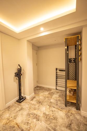 an empty room with a vaulted ceiling and a room with at ISTANBUL SUITE in Istanbul