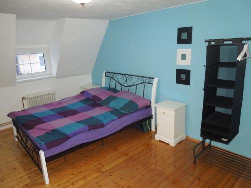 מיטה או מיטות בחדר ב-Apartments Benešov Nad Ploučnicí