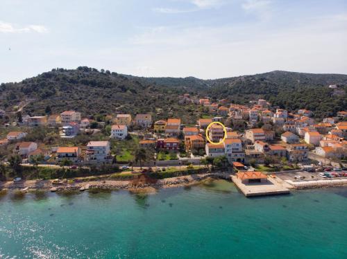 an aerial view of a town on the water at Apartment Kreso in Tkon