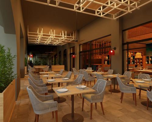 a restaurant with wooden tables and chairs and a chandelier at Secrets Playa Esmeralda Resort & Spa - All Inclusive in Miches