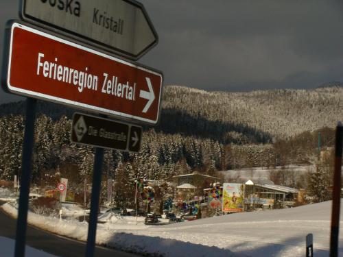 a sign on the side of a snow covered mountain at Drei Tannen in Bodenmais