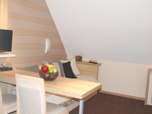 Apartmani Kopaonik Centar Maglicにあるテレビまたはエンターテインメントセンター