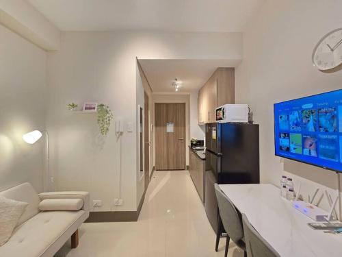 1BR Condotel with Balcony at FAME Residences #FM59