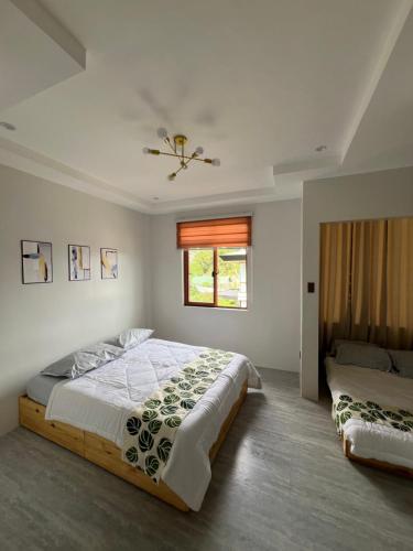 Llit o llits en una habitació de Lazarus Tagaytay