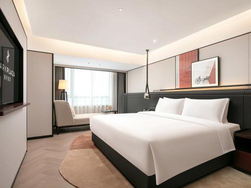 Una cama o camas en una habitación de Park Plaza Xi'an North Station