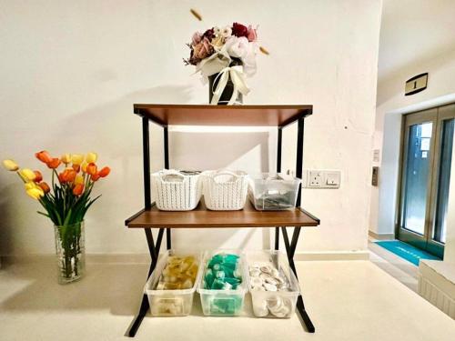 a shelf with differentiatesiatesiatesiatesiatesiatesiatesiatesktop at Well Hotel by UHA in Johor Bahru
