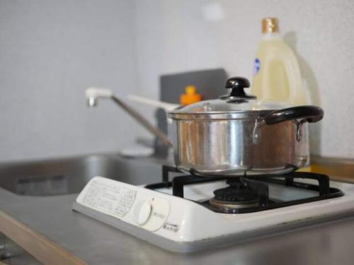 a pot sitting on top of a stove at Amika First 303 AF33 in Tokyo