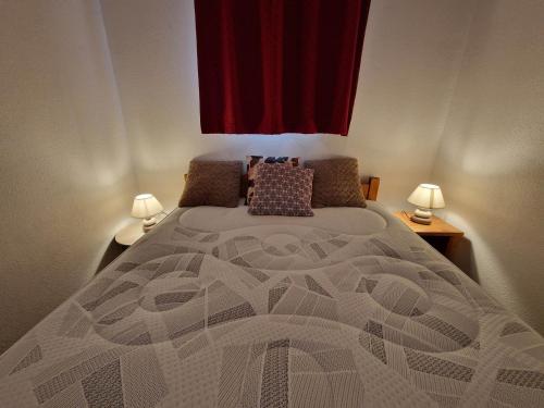 Photo de la galerie de l'établissement Appartement 3 pièces pour 6, proche télésiège à Valfréjus - FR-1-265-368, à Modane