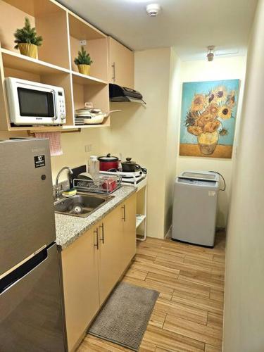 Η κουζίνα ή μικρή κουζίνα στο A Retro Style One Bedroom