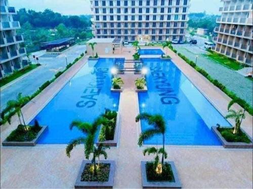 Πισίνα στο ή κοντά στο Alex's Staycation