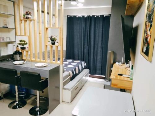 Χώρος καθιστικού στο Alex's Staycation