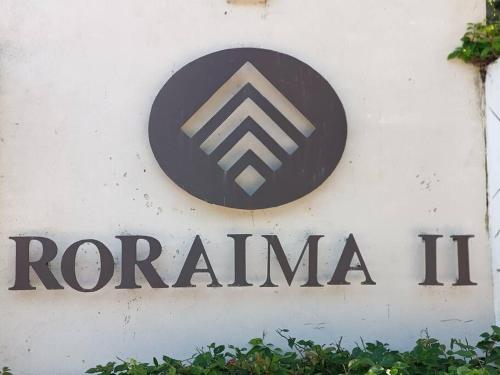 a sign for a romania sign on a wall at Departamento Colibrí in Playa del Carmen