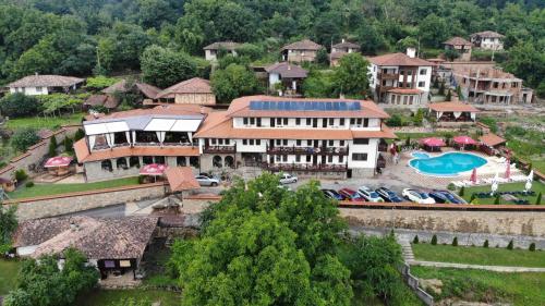 an aerial view of a large house with a swimming pool at Complex Panorama in Elena