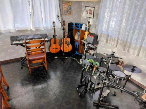 Phòng/tiện nghi tập thể dục tại Orange house Izu Simoda