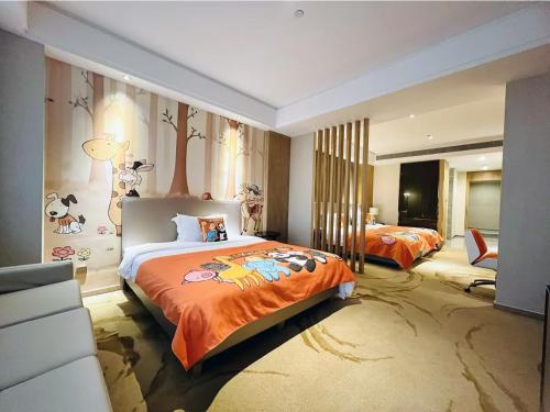 a large bedroom with two beds and a couch at Best Boutique Hotel in Nanhui
