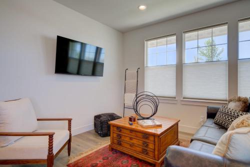 a living room with a couch and a tv at Spacious 3BR Home - Perfect Belgrade Getaway in Belgrade