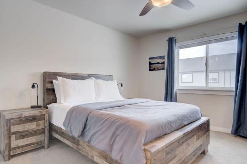 a bedroom with a large bed and a window at Mountain View Haven in Belgrade in Belgrade