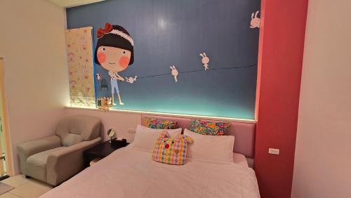 a bedroom with a bed and a chair and a painting at ChaoPingJia Homestay in Luodong