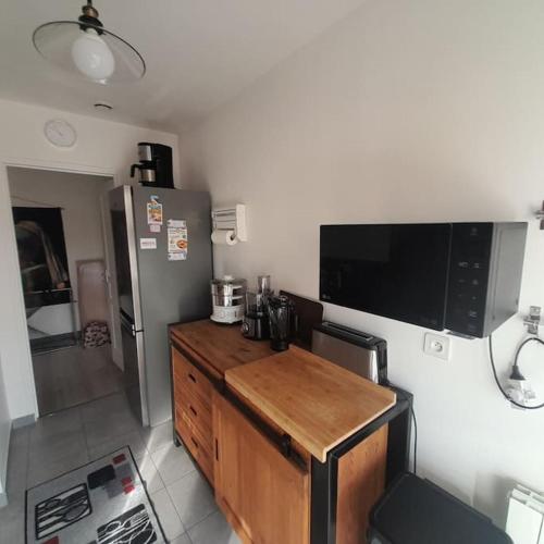 Η κουζίνα ή μικρή κουζίνα στο Petit Paradis Hyper Centre Sanary 3 chambres Parking Clims Wifi Terrasse