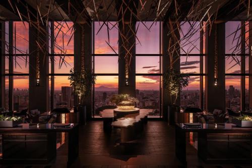 a restaurant with a view of a city at Shinagawa Prince Hotel in Tokyo