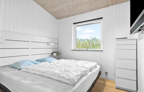 Ein Bett oder Betten in einem Zimmer der Unterkunft Three-Bedroom Holiday Home In Haderslev