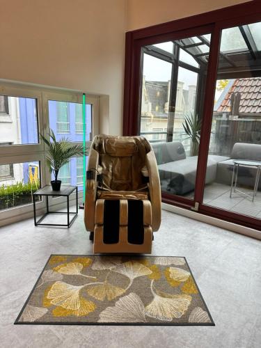 Coin salon dans l'établissement City-Apartment mit Dachterrasse & Massagesessel in der Fußgängerzone K4