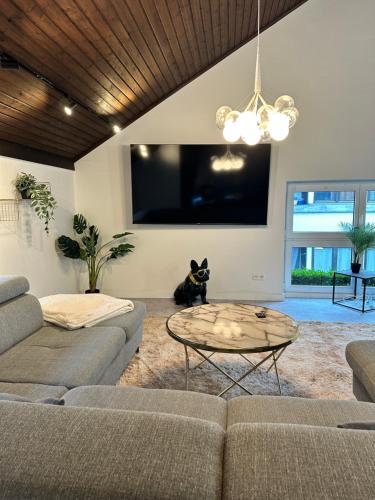 Coin salon dans l'établissement City-Apartment mit Dachterrasse & Massagesessel in der Fußgängerzone K4