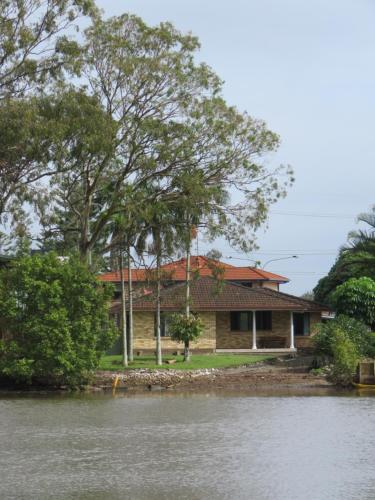 a house on the banks of a river at Waterfront house in Currumbin in Gold Coast