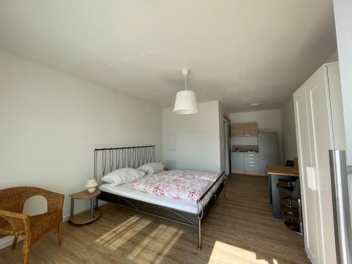 Katil atau katil-katil dalam bilik di Gästezimmer im Weingut Kissel