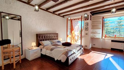 Katil atau katil-katil dalam bilik di Abetina Apartment - Piccola Svizzera